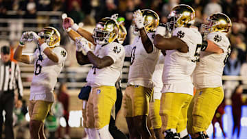 Notre Dame Fighting Irish running back Jeremiyah Love (4) and teammates.