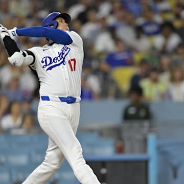 Sep 6, 2024; Los Angeles, California, USA;  Los Angeles Dodgers designated hitter Shohei Ohtani (17) hits his 45th home run on the season in the sixth inning against the Cleveland Guardians at Dodger Stadium.