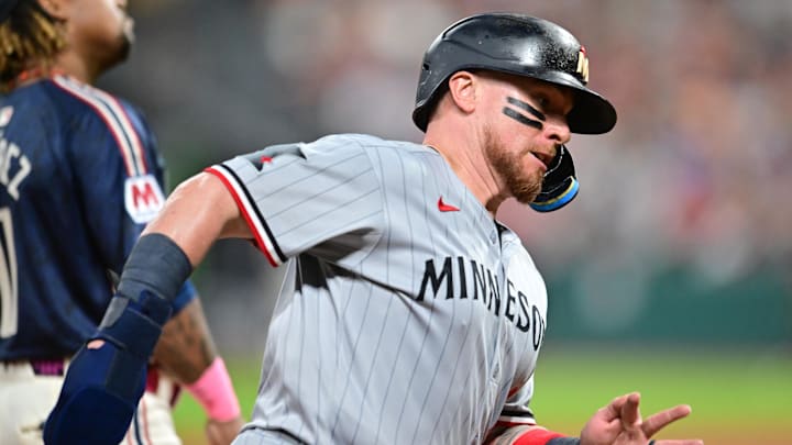 Aug 1, 2025; Cleveland, Ohio, USA; Minnesota Twins catcher Christian Vazquez (8) rounds third base en route to scoring during the seventh inning against the Cleveland Guardians at Progressive Field. Mandatory Credit: Ken Blaze-Imagn Images