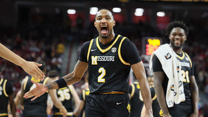 Feb 22, 2025; Fayetteville, Arkansas, USA; Missouri Tigers guard Tamar Bates (2) celebrates at the end of the first half against the Arkansas Razorbacks at Bud Walton Arena. Mandatory Credit: Nelson Chenault-Imagn Images Feb 22, 2025; Fayetteville, Arkansas, USA; Missouri Tigers guard Tamar Bates (2) celebrates at the end of the first half against the Arkansas Razorbacks at Bud Walton Arena. Mandatory Credit: Nelson Chenault-Imagn Images