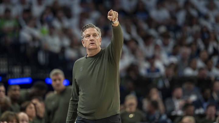 May 14, 2025; Minneapolis, Minnesota, USA; Minnesota Timberwolves head coach Chris Finch looks on against the Golden State Warriors in the first half during game five of the second round for the 2025 NBA Playoffs at Target Center. Mandatory Credit: Jesse Johnson-Imagn Images