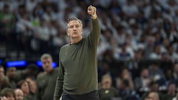 May 14, 2025; Minneapolis, Minnesota, USA; Minnesota Timberwolves head coach Chris Finch looks on against the Golden State Warriors in the first half during game five of the second round for the 2025 NBA Playoffs at Target Center. Mandatory Credit: Jesse Johnson-Imagn Images