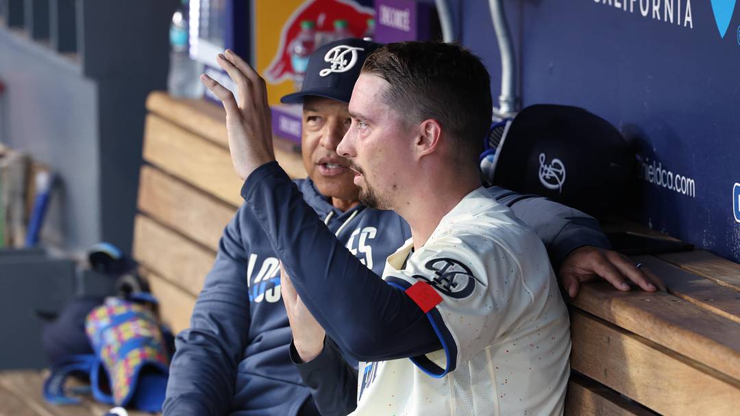 May 9, 2026; Los Angeles, California, USA;  Los Angeles Dodgers pitcher Blake Snell (7) talks with manager Dave Roberts (30) in the dugout in the fourth inning against the Atlanta Braves at Dodger Stadium. Mandatory Credit: Kiyoshi Mio-Imagn Images