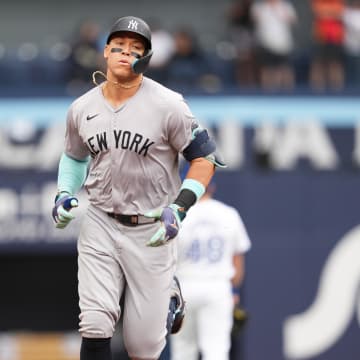 New York Yankees designated hitter Aaron Judge (99) runs the bases after hitting a two run home run against the Toronto Blue Jays during the first inning at Rogers Centre on June 30.