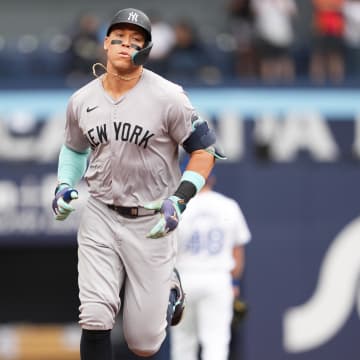 Jun 30, 2024; Toronto, Ontario, CAN; New York Yankees designated hitter Aaron Judge (99) runs the bases after hitting a two run home run against the Toronto Blue Jays during the first inning at Rogers Centre.