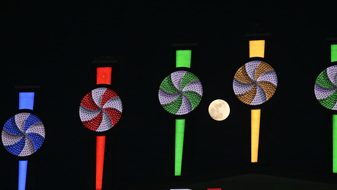 Apr 11, 2025; Chicago, Illinois, USA; The “pink moon” is seen near the pinwheels during a game between the Boston Red Sox and Chicago White Sox at Guaranteed Rate Field. Mandatory Credit: Matt Marton-Imagn Images