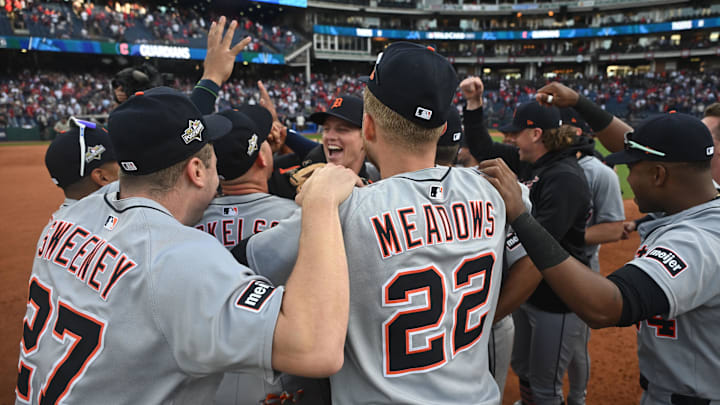 The Detroit Tigers celebrate after beating the Cleveland Guardians 6-3 in Game 3 of the American League wild card series.