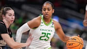 Oregon Ducks guard Deja Kelly (25) rushes up the court Thursday, March 6, 2025, during the Big Ten women's tournament at Gainbridge Fieldhouse in Indianapolis. Indiana Hoosiers defeated the Oregon Ducks, 78-62.