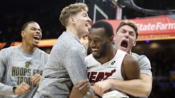 Nov 10, 2025; Miami, Florida, USA;  Miami Heat forward Andrew Wiggins (22) reacts to winning the game with teammates against the Cleveland Cavaliers during overtime at Kaseya Center. Mandatory Credit: Rhona Wise-Imagn Images