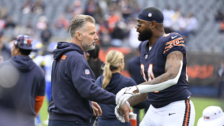 Sep 29, 2024; Chicago, Illinois, USA;  Chicago Bears head coach Matt Eberflus and Chicago Bears tight end Marcedes Lewis (84) before the game against the Los Angeles Rams at Soldier Field. Mandatory Credit: Matt Marton-Imagn Images