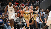 Nov 16, 2025; Washington, District of Columbia, USA;  Washington Wizards forward Corey Kispert (24) dribbles the ball up court against the Brooklyn Nets during the third quarter at Capital One Arena. Mandatory Credit: Rafael Suanes-Imagn Images