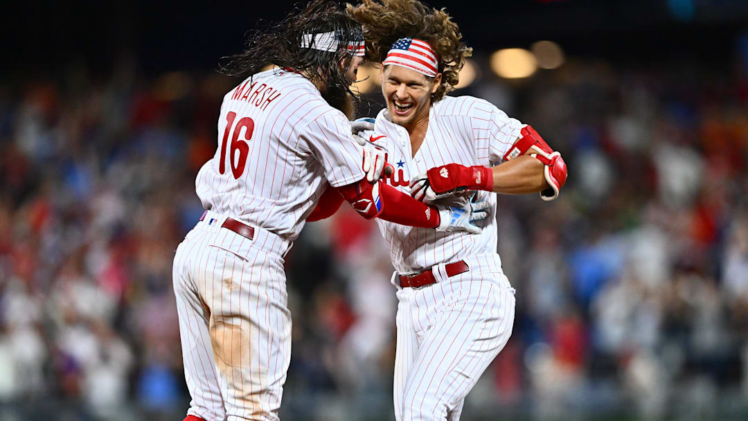 Jul 25, 2023; Philadelphia, Pennsylvania, USA; Philadelphia Phillies infielder Alec Bohm (28) celebrates with outfielder Brandon Marsh (16) after hitting a game-winning RBI single against the Baltimore Orioles in the ninth inning at Citizens Bank Park. Jul 25, 2023; Philadelphia, Pennsylvania, USA; Philadelphia Phillies infielder Alec Bohm (28) celebrates with outfielder Brandon Marsh (16) after hitting a game-winning RBI single against the Baltimore Orioles in the ninth inning at Citizens Bank Park.