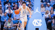Nov 18, 2025; Chapel Hill, North Carolina, USA; North Carolina Tar Heels guard Luka Bogavac (44) brings the ball up court against the Navy Midshipmen during the second half at Dean E. Smith Center. 