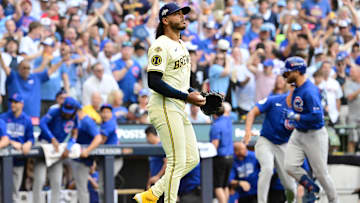 Oct 4, 2025; Milwaukee, Wisconsin, USA; Milwaukee Brewers starting pitcher Freddy Peralta (51) reacts after giving up a home run to Chicago Cubs first baseman Michael Busch (29) during the first inning of game one of the NLDS round for the 2025 MLB playoffs at American Family Field. Mandatory Credit: Benny Sieu-Imagn Images