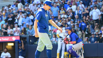 Jun 30, 2024; Milwaukee, Wisconsin, USA; Chicago Cubs manager Craig Counsell walks back to the dugout after making a pitching change in the fourth inning against the Milwaukee Brewers at American Family Field. Mandatory Credit: Benny Sieu-USA TODAY Sports