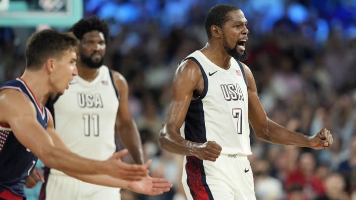 Aug 8, 2024; Paris, France; United States guard Kevin Durant (7) celebrates during the second half against Serbia in a men's basketball semifinal game during the Paris 2024 Olympic Summer Games at Accor Arena. Mandatory Credit: Kyle Terada-USA TODAY Sports