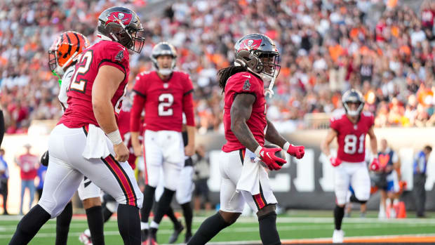 Tampa Bay Buccaneers running back Bucky Irving (7) celebrates a touchdown carry in the first quarter of the NFL Preseason Wee