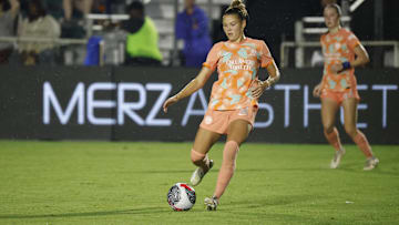 Jul 20, 2024; Cary, North Carolina, USA; Orlando Pride defender Carrie Lawrence (12) plays the ball in the second half against the North Carolina Courage at WakeMed Soccer Park. Mandatory Credit: Jaylynn Nash-Imagn Images