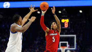 Dec 14, 2024; Lexington, Kentucky, USA; Louisville Cardinals guard Terrence Edwards Jr. (5) shoots the ball during the first half against the Kentucky Wildcats at Rupp Arena at Central Bank Center. Mandatory Credit: Jordan Prather-Imagn Images