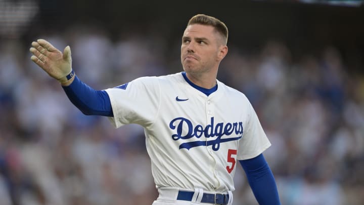 Los Angeles Dodgers first baseman Freddie Freeman (5) acknowledges the crowd as he got a standing ovation as he approached the plate for his first at bat against the Philadelphia Phillies at Dodger Stadium on Aug 5.