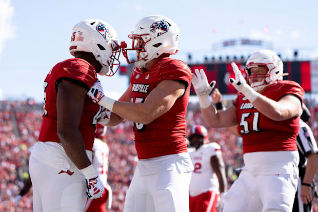 Louisville Cardinals celebrate another touchdown 