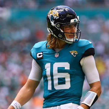 Sep 8, 2024; Miami Gardens, Florida, USA; Jacksonville Jaguars quarterback Trevor Lawrence (16) looks on against the Miami Dolphins during the first quarter at Hard Rock Stadium. Mandatory Credit: Sam Navarro-Imagn Images