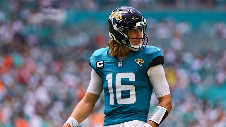 Sep 8, 2024; Miami Gardens, Florida, USA; Jacksonville Jaguars quarterback Trevor Lawrence (16) looks on against the Miami Dolphins during the first quarter at Hard Rock Stadium. Mandatory Credit: Sam Navarro-Imagn Images