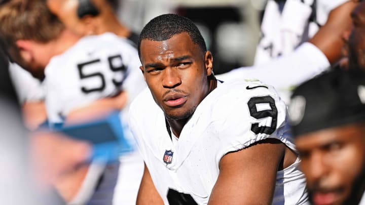 Oct 22, 2023; Chicago, Illinois, USA;  Las Vegas Raiders defensive end Tyree Wilson (9) takes a breather on the sidelines against the Chicago Bears at Soldier Field. Mandatory Credit: Jamie Sabau-USA TODAY Sports