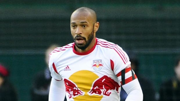 New York Red Bulls forward Thierry Henry advances the ball against the D.C. United during the second half.
