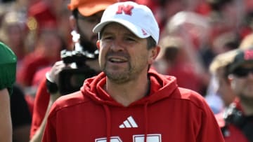 Nebraska football quarterbacks coach Glenn Thomas looks on