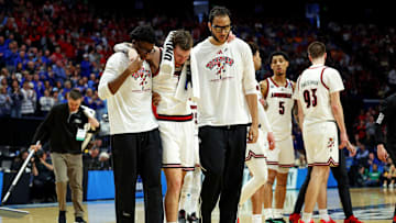 Mar 20, 2025; Lexington, KY, USA; Louisville Cardinals guard Reyne Smith (6) is helped off the court after being injured during the second half against the Louisville Cardinals in the first round of the NCAA Tournament at Rupp Arena. Mandatory Credit: Jordan Prather-Imagn Images