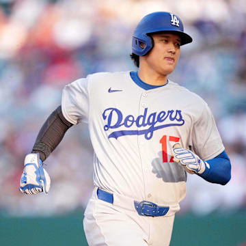 Anaheim, California, USA; Los Angeles Dodgers designated hitter Shohei Ohtani (17) runs to third base in the first inning against the Los Angeles Angels at Angel Stadium.