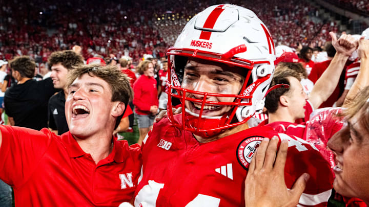 Sep 7, 2024; Lincoln, Nebraska, USA; Nebraska Cornhuskers tight end Luke Lindenmeyer celebrates with fans after defeating the Colorado Buffaloes at Memorial Stadium.