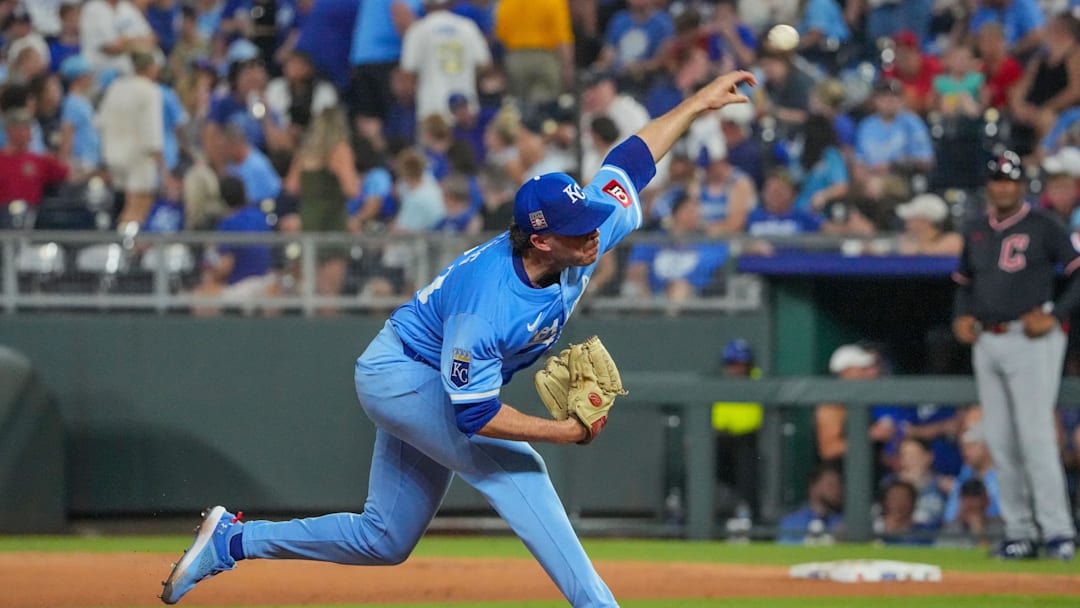 Jul 26, 2025; Kansas City, Missouri, USA; Kansas City Royals relief pitcher Sam Long (73) delivers a pitch against the Cleveland Guardians in the ninth inning at Kauffman Stadium. Mandatory Credit: Denny Medley-Imagn Images