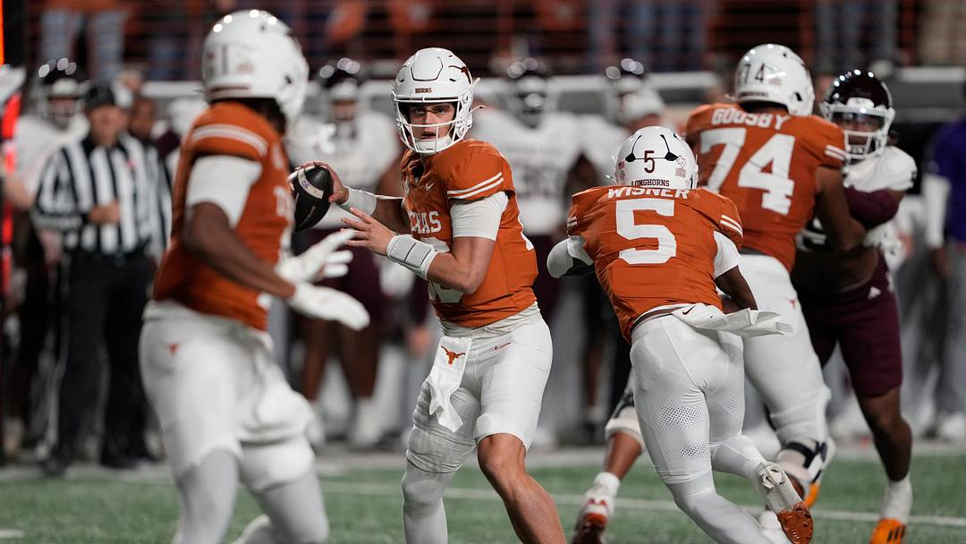 Nov 28, 2025; Austin, Texas, USA; Texas Longhorns quarterback Arch Manning throws a pass during the first half against the Texas A&M Aggies at Darrell K Royal-Texas Memorial Stadium. Mandatory Credit: Scott Wachter-Imagn Images