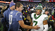 Nov 13, 2025; Foxborough, Massachusetts, USA; New England Patriots quarterback Drake Maye (10) and New York Jets quarterback Justin Fields (7) react after the game at Gillette Stadium. Mandatory Credit: Eric Canha-Imagn Images