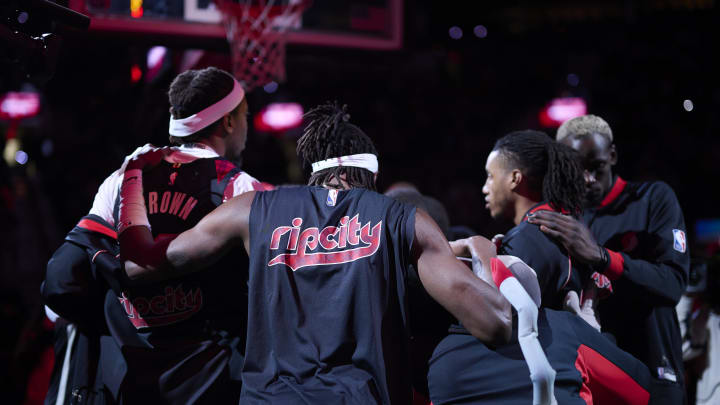 Dec 29, 2023; Portland, Oregon, USA; Portland Trail Blazers forward Jerami Grant (9) huddles with teammates after introductions before a game against the San Antonio Spurs at Moda Center. Mandatory Credit: Troy Wayrynen-USA TODAY Sports