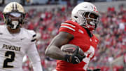 Nov 9, 2024; Columbus, Ohio, USA; Ohio State Buckeyes wide receiver Jeremiah Smith (4) dances into the end zone untouched by Purdue Boilermakers defensive back Nyland Green (2) during the first half at Ohio Stadium.