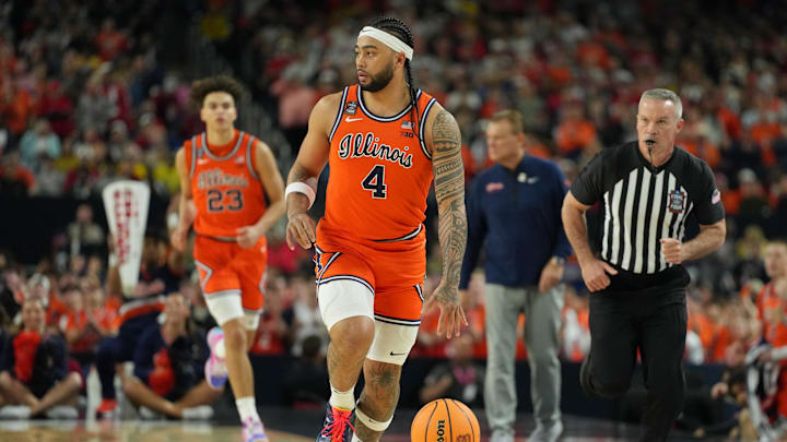 Apr 4, 2026; Indianapolis, IN, USA; Illinois Fighting Illini guard Kylan Boswell (4) dribbles the ball against the UConn Huskies during the first half of a semifinal of the Final Four of the men's 2026 NCAA Tournament at Lucas Oil Stadium. Mandatory Credit: Bob Donnan-Imagn Images
