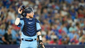 Jul 2, 2023; Toronto, Ontario, CAN; Toronto Blue Jays catcher Danny Jansen (9) takes off his mask at an MLB against the Boston Red Sox at Rogers Centre. Mandatory Credit: Kevin Sousa-USA TODAY Sports
