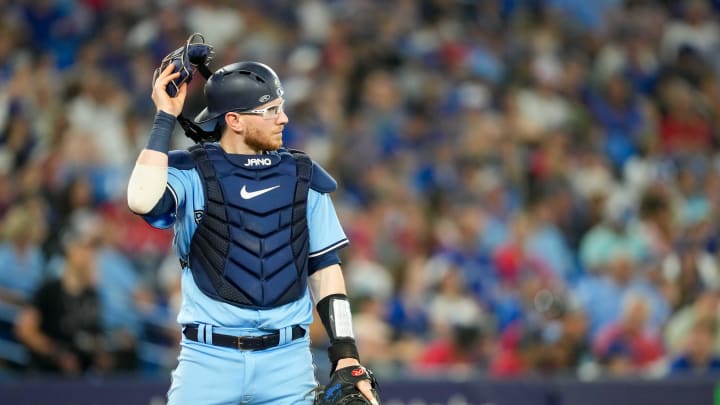 Jul 2, 2023; Toronto, Ontario, CAN; Toronto Blue Jays catcher Danny Jansen (9) takes off his mask at an MLB against the Boston Red Sox at Rogers Centre. Mandatory Credit: Kevin Sousa-USA TODAY Sports