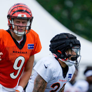 Cincinnati Bengals quarterback Joe Burrow (9) sets up a play during a preseason training camp practice at the Paycor Stadium practice field in downtown Cincinnati on Wednesday, Aug. 7, 2024.Jo