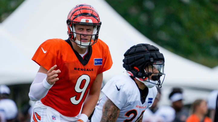 Cincinnati Bengals quarterback Joe Burrow (9) sets up a play during a preseason training camp practice at the Paycor Stadium practice field in downtown Cincinnati on Wednesday, Aug. 7, 2024.