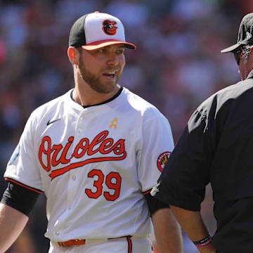 Sep 2, 2024; Baltimore, Maryland, USA; Baltimore Orioles pitcher Corbin Burnes (39) talks with umpire Hunter Wendelstedt after the second inning against the Chicago White Sox at Oriole Park at Camden Yards.