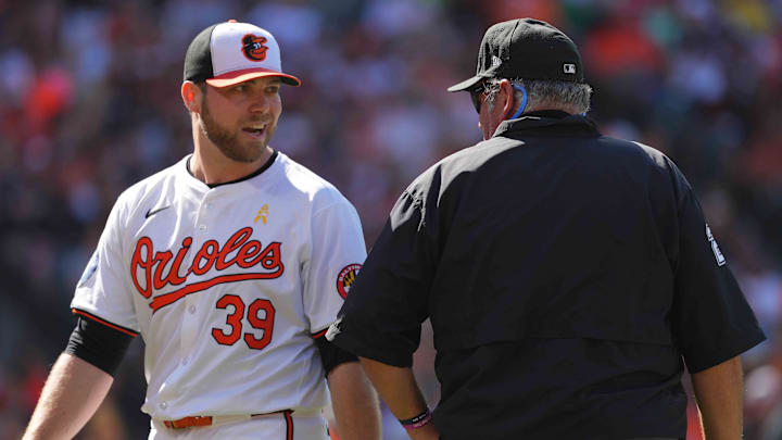 Sep 2, 2024; Baltimore, Maryland, USA; Baltimore Orioles pitcher Corbin Burnes (39) talks with umpire Hunter Wendelstedt after the second inning against the Chicago White Sox at Oriole Park at Camden Yards.