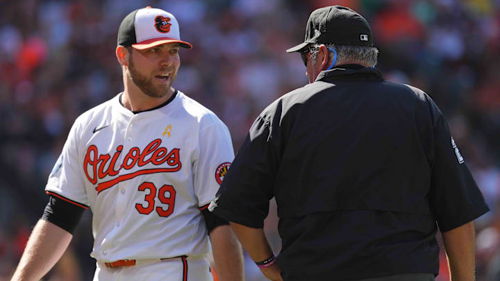 Sep 2, 2024; Baltimore, Maryland, USA; Baltimore Orioles pitcher Corbin Burnes (39) talks with umpire Hunter Wendelstedt after the second inning against the Chicago White Sox at Oriole Park at Camden Yards