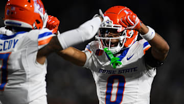 Boise State's Ty Benefield and A'Marion McCoy celebrate during a game against San Jose State