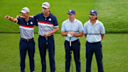  Team USA's Collin Morikawa and Harris English pose with Team Europe's Rory McIlroy Tommy Fleetwood on the first tee.