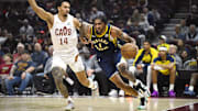Oct 10, 2024; Cleveland, Ohio, USA; Cleveland Cavaliers guard Jules Bernard (14) defends Indiana Pacers forward Obi Toppin (1) in the first quarter at Rocket Mortgage FieldHouse. Mandatory Credit: David Richard-Imagn Images
