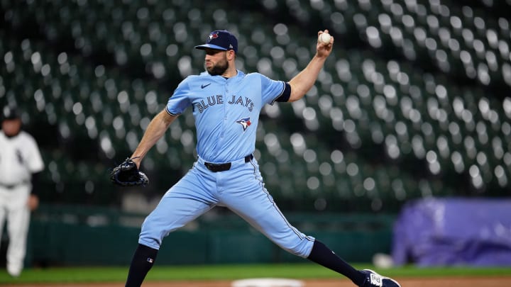 May 28, 2024; Chicago, Illinois, USA;  Toronto Blue Jays pitcher Tim Mayza (58) pitches against the Chicago White Sox at Guaranteed Rate Field. Mandatory Credit: Jamie Sabau-USA TODAY Sports